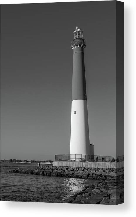 Barnegat Lighthouse And Inlet New Jersey Black And White Canvas Print featuring the photograph Barnegat Lighthouse and Inlet New Jersey Black and White by Terry DeLuco