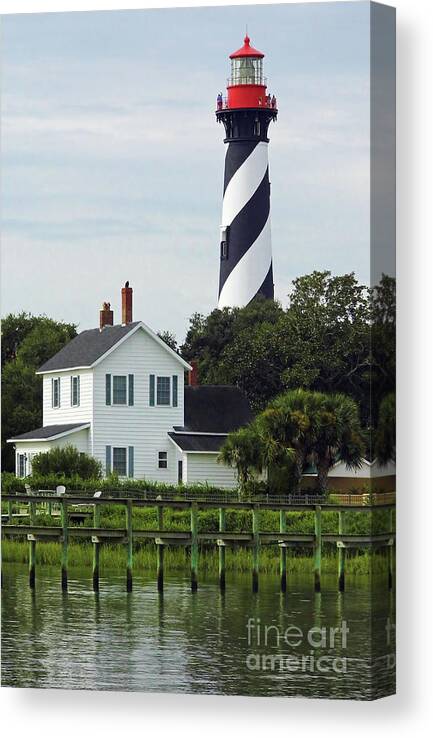 Lighthouse Canvas Print featuring the photograph Beautiful Waterfront Lighthouse by D Hackett