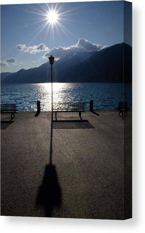 Bench Canvas Print featuring the photograph Bench and street lamp by Mats Silvan