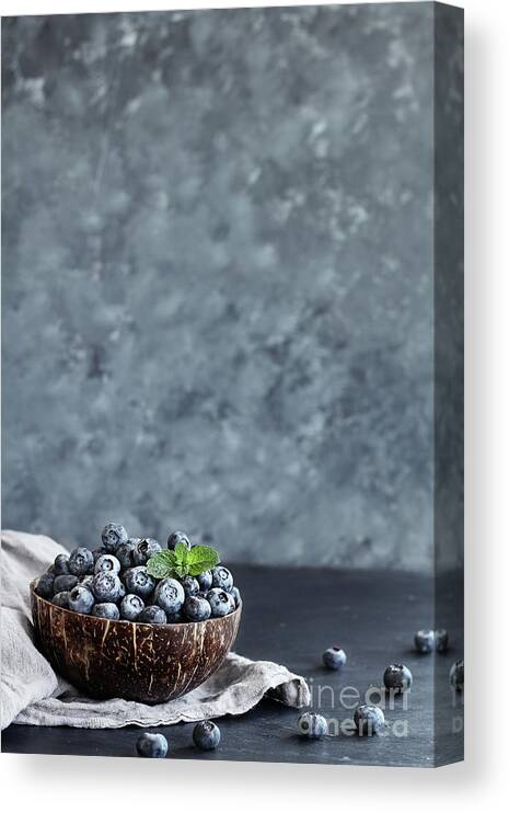 Blueberries Canvas Print featuring the photograph Blueberries in a Coconut Bowl by Stephanie Frey