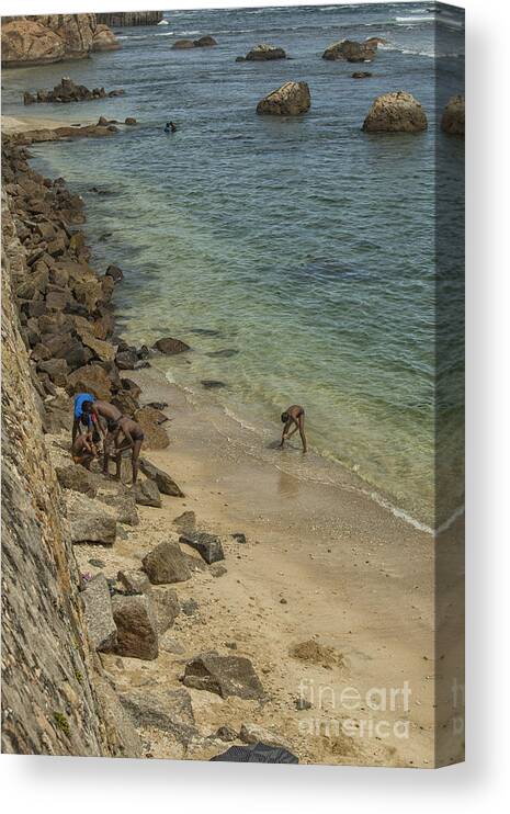 Bastion Canvas Print featuring the photograph Boys at the beach in Galle, Sri Lanka by Patricia Hofmeester