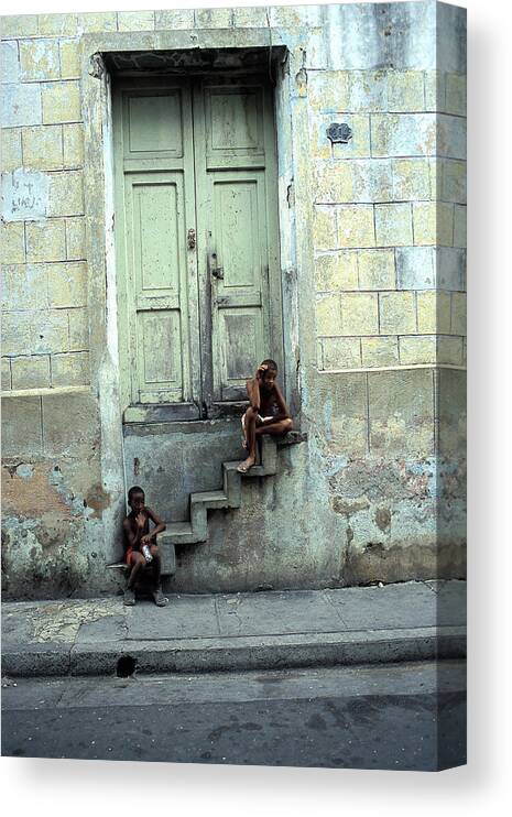 Santiago De Cuba Canvas Print featuring the photograph Boys On Stairs by Marcus Best