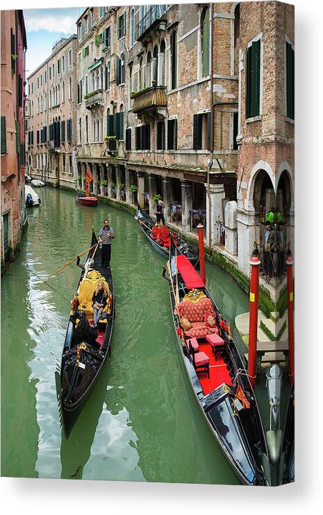 Venice Canvas Print featuring the photograph Canal with gondolas in Venice Italy by Matthias Hauser
