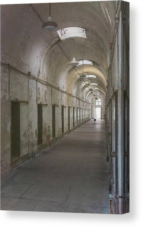 Eastern State Penitentiary Canvas Print featuring the photograph Cellblock Hallway by Tom Singleton
