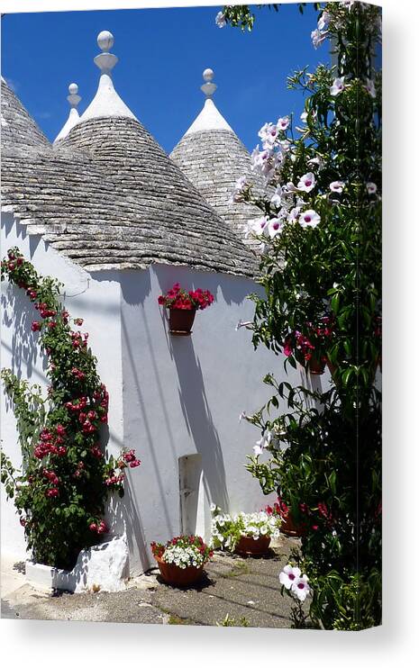 Alberobello Canvas Print featuring the photograph Charming Trulli by Carla Parris