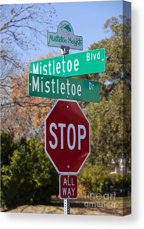 Mistletoe Canvas Print featuring the photograph Christmas theme street sign by Anthony Totah