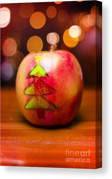 Christmas Canvas Print featuring the photograph Christmas tree painted on apple decoration by Jorgo Photography