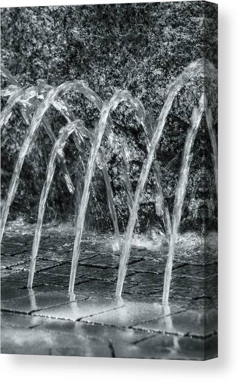 Water Canvas Print featuring the photograph City Fountain by Jason Hughes