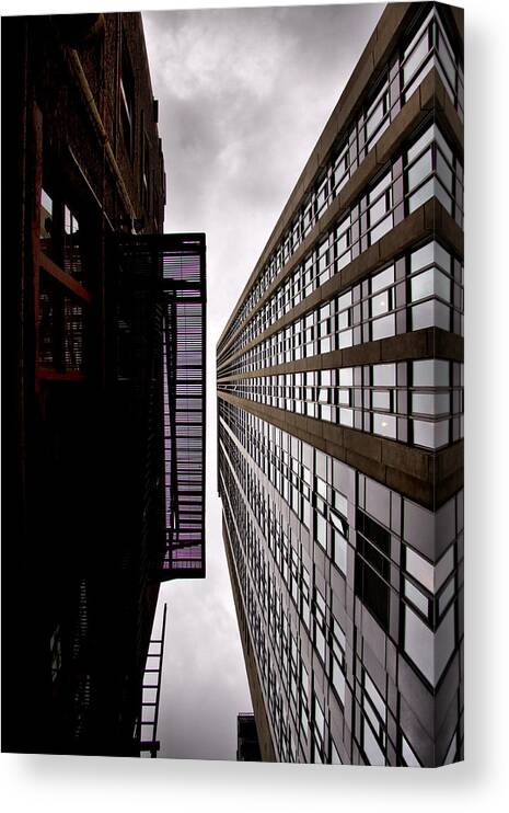 City Scape Canvas Print featuring the photograph Close encounter by Russell Styles