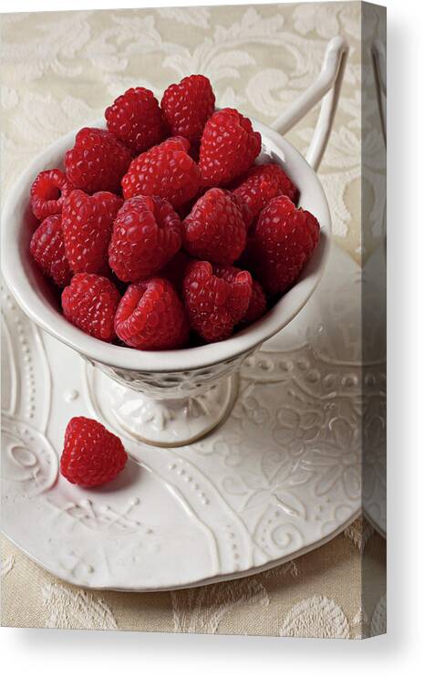 Raspberries Fruit Cup Food Berry Canvas Print featuring the photograph Cup full of raspberries by Garry Gay