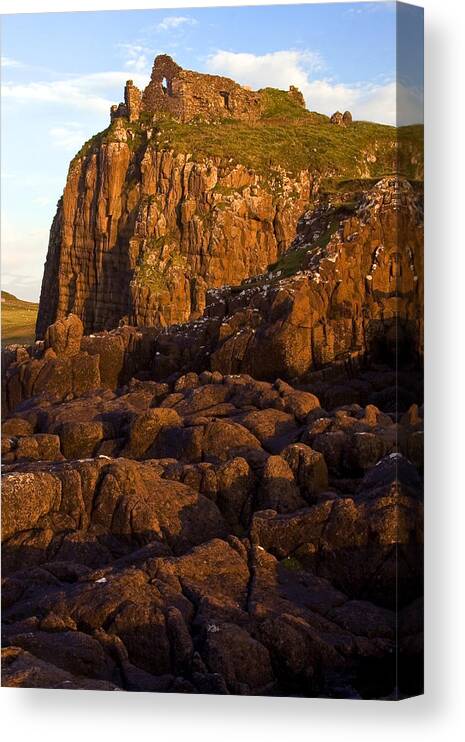 Scotland Canvas Print featuring the photograph Duntulm Castle Isle of Skye by John McKinlay