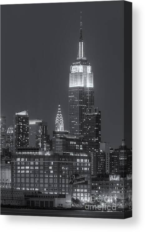 Clarence Holmes Canvas Print featuring the photograph Empire State and Chrysler Buildings at Twilight II by Clarence Holmes