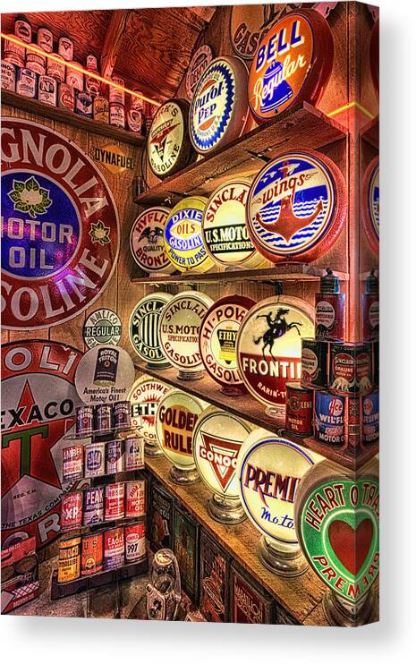 Gas Pump Globes Canvas Print featuring the photograph Globes of the Past by Daniel George