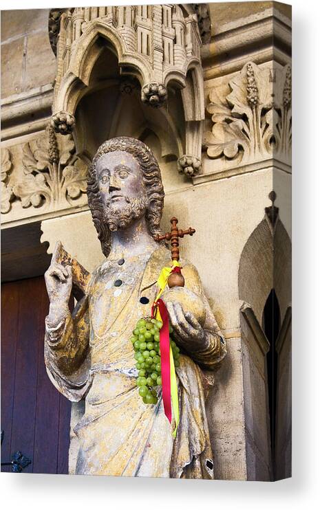 Old Religious Statue Canvas Print featuring the photograph Grapes on Statue by Sally Weigand