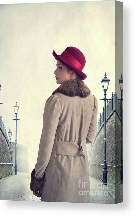 Historical Canvas Print featuring the photograph Historical Woman In An Overcoat And Red Hat by Lee Avison