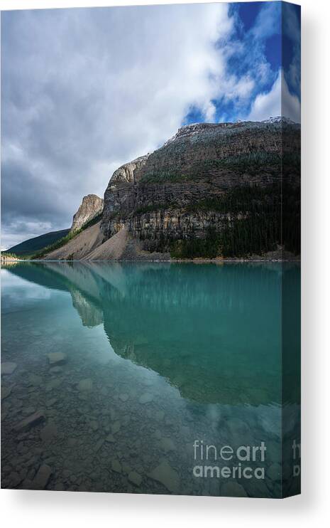 Lake Moraine Canvas Print featuring the photograph Lake Moraine Waters to Sky by Mike Reid