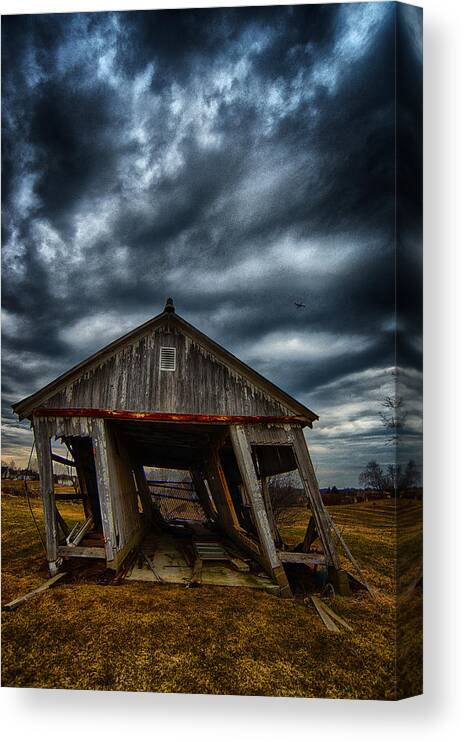 Stormy Canvas Print featuring the photograph Leaning Building Under A Stormy Sky by Dick Pratt
