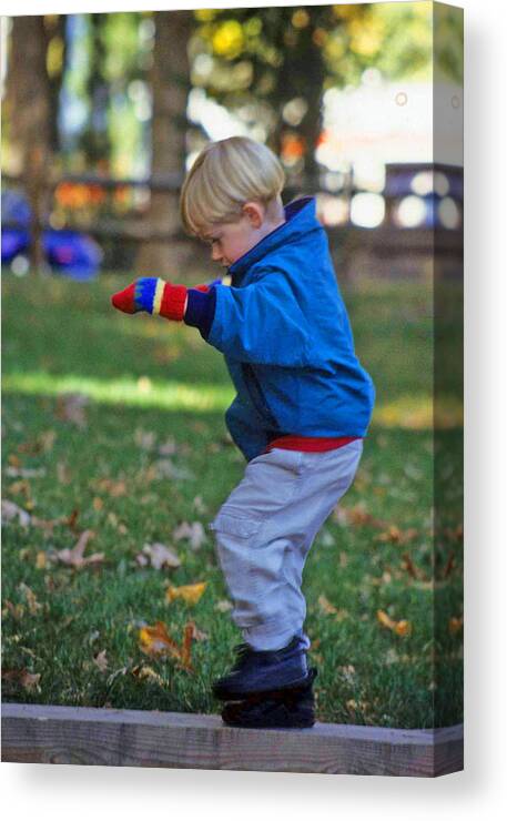 Boy Balancing Canvas Print featuring the photograph Life In Perfect Balance by Laurie Paci