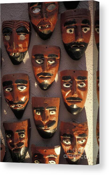 Mexico Canvas Print featuring the photograph Mexican Devil Masks by John Mitchell