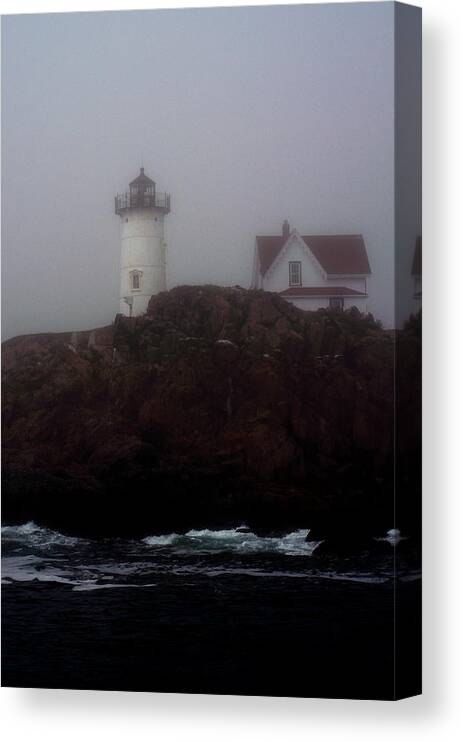 Lighthouse Canvas Print featuring the photograph Fog Lifting by Richard Ortolano