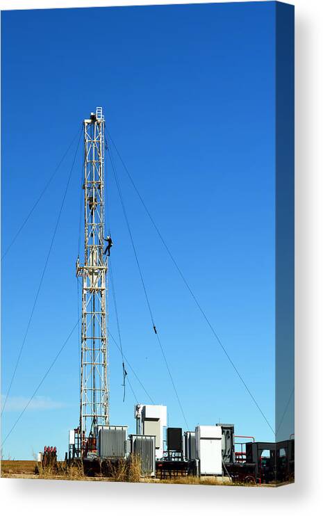 Oil Canvas Print featuring the photograph Oil Field Man At Work - photography by Ann Powell