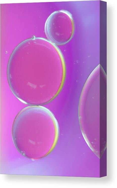 Water Canvas Print featuring the photograph Oil on water abstract by Andy Myatt