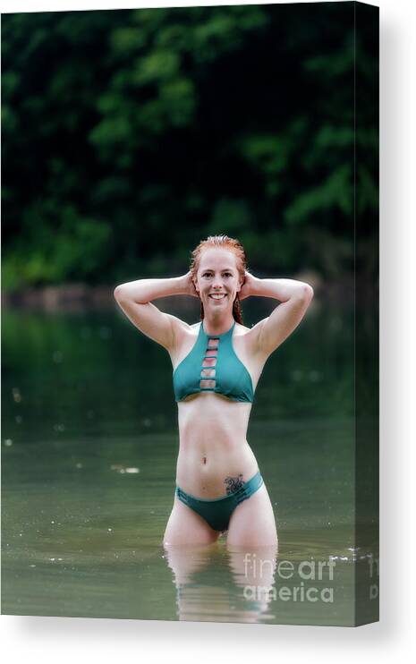 Patty Smith Canvas Print featuring the photograph Patty standing in the water smiling by Dan Friend