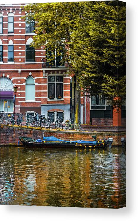 Boats Canvas Print featuring the photograph Reflections in Amsterdam by Debra and Dave Vanderlaan