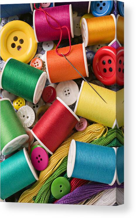 Spools Canvas Print featuring the photograph Spools of thread with buttons by Garry Gay