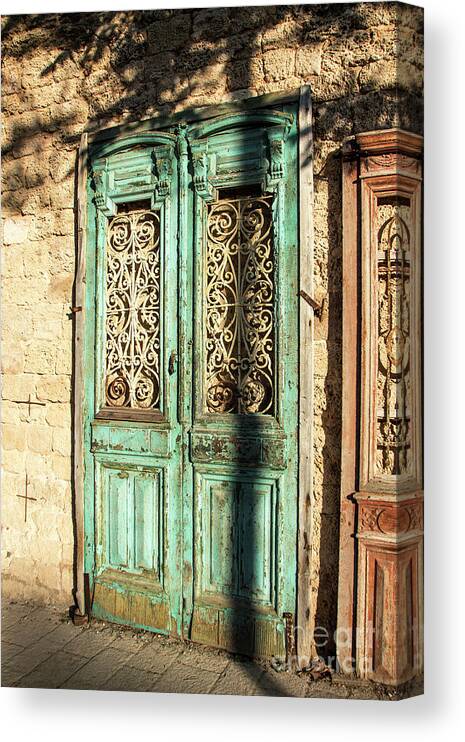 Old Canvas Print featuring the photograph The old green door by Adriana Zoon