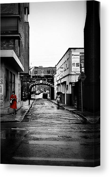 Dublin Canvas Print featuring the photograph The Rail and the Red Raincoat by Nadalyn Larsen