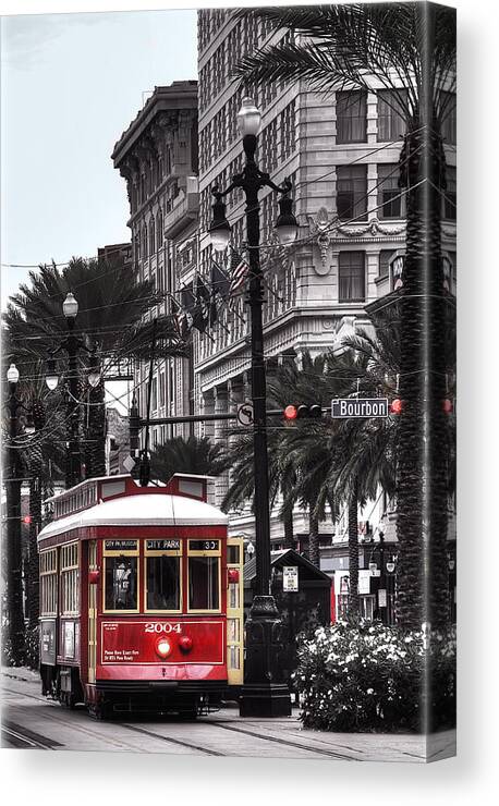 Nola Canvas Print featuring the photograph Trolley on Bourbon and Canal by Tammy Wetzel