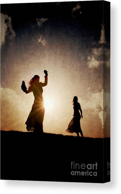 Woman Canvas Print featuring the photograph Two women dancing at sunset by Clayton Bastiani