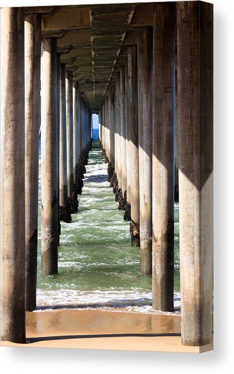 America Canvas Print featuring the photograph Under the Pier in Orange County California by Paul Velgos