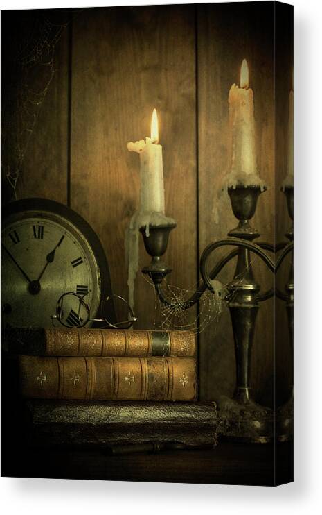 Vintage Canvas Print featuring the photograph Vintage Books With Candles And An Old Clock by Ethiriel Photography