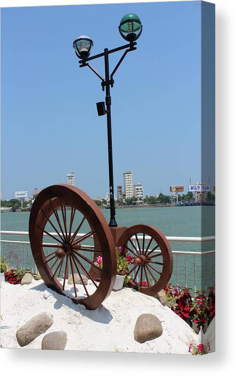 Wheels Canvas Print featuring the photograph Wheels by the Water by Samantha Delory