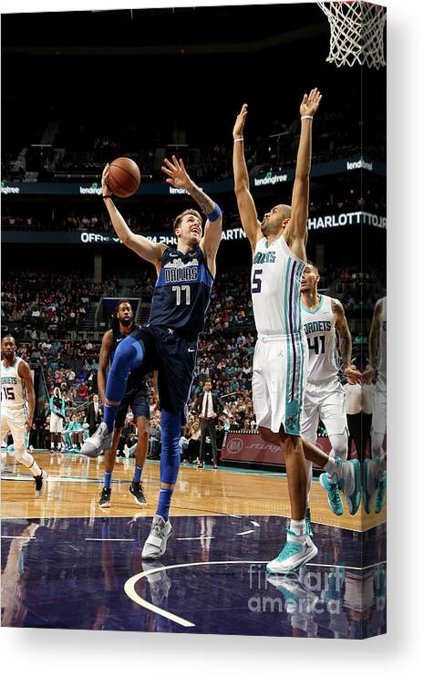 Luka Doncic Canvas Print featuring the photograph Dallas Mavericks V Charlotte Hornets by Brock Williams-smith