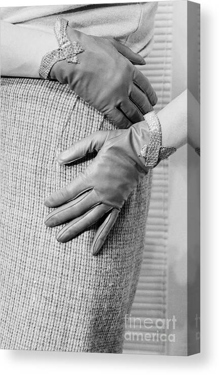Mid Adult Women Canvas Print featuring the photograph Fashion Model Wearing Leather Gloves #1 by Bettmann