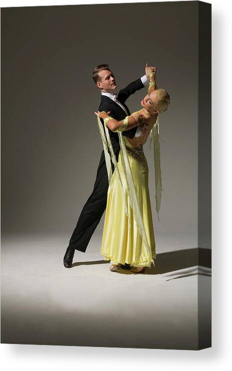 Caucasian Ethnicity Canvas Print featuring the photograph Man And Woman Ballroom Dancing #1 by Pm Images