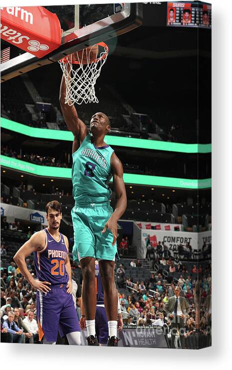 Bismack Biyombo Canvas Print featuring the photograph Phoenix Suns V Charlotte Hornets by Kent Smith