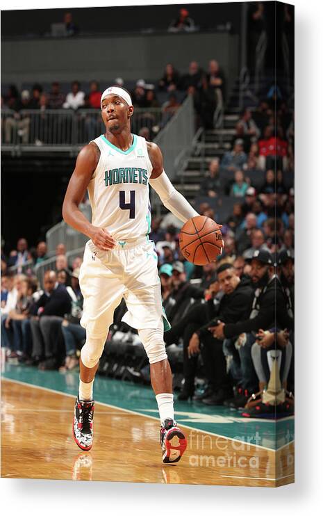 Devonte' Graham Canvas Print featuring the photograph Chicago Bulls V Charlotte Hornets by Kent Smith