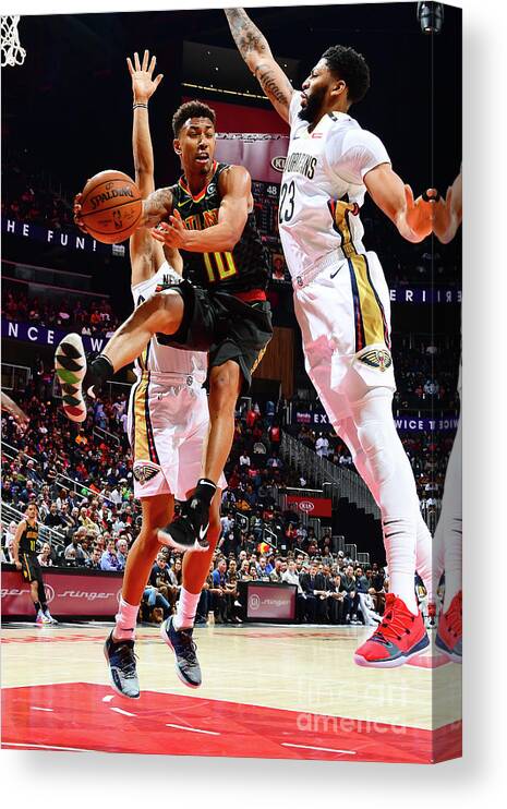 Atlanta Canvas Print featuring the photograph New Orleans Pelicans V Atlanta Hawks by Scott Cunningham