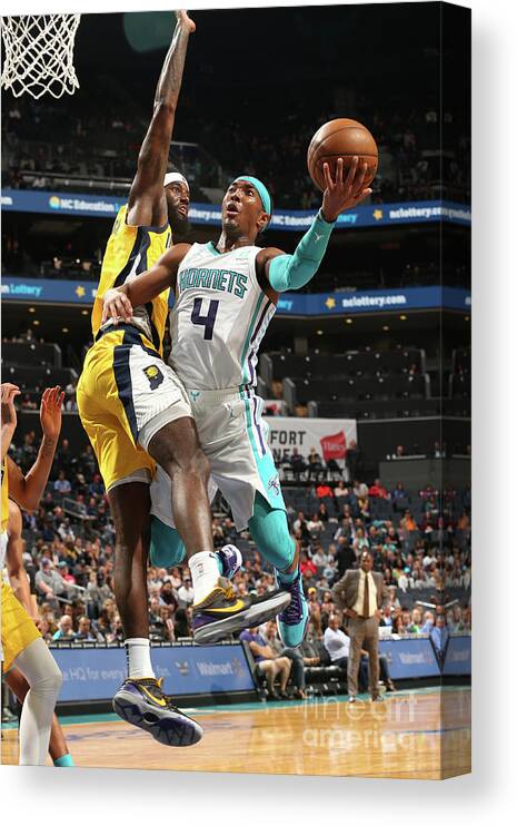 Devonte' Graham Canvas Print featuring the photograph Indiana Pacers V Charlotte Hornets by Kent Smith