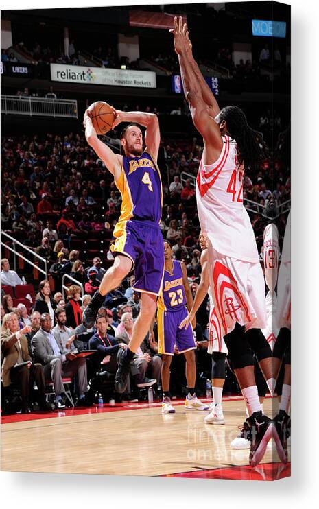 Marcelo Huertas Canvas Print featuring the photograph Los Angeles Lakers V Houston Rockets by Bill Baptist