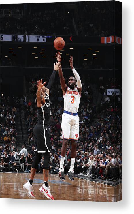 Tim Hardaway Jr. Canvas Print featuring the photograph New York Knicks V Brooklyn Nets by Nathaniel S. Butler