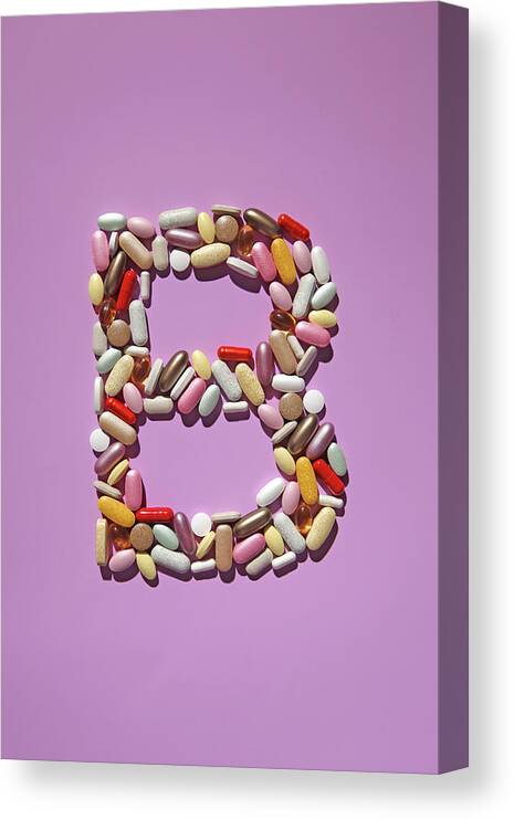 Vitamin Canvas Print featuring the photograph Multi-vitamin Pills And Capsules #2 by Nicholas Eveleigh