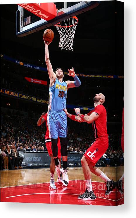 Jusuf Nurkić Canvas Print featuring the photograph Denver Nuggets V Washington Wizards by Ned Dishman