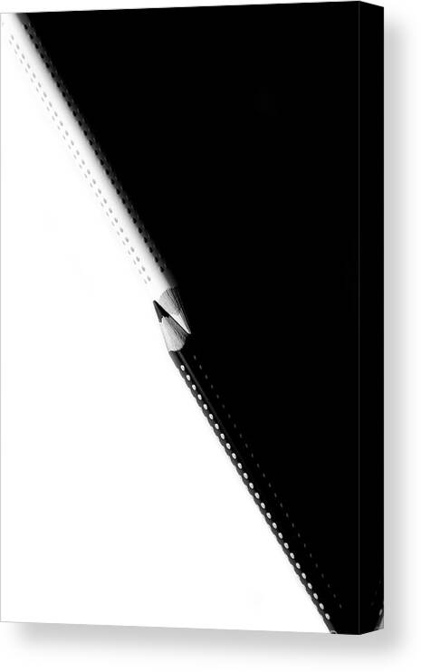 Education Canvas Print featuring the photograph Two drawing pencils on a black and white surface. by Michalakis Ppalis