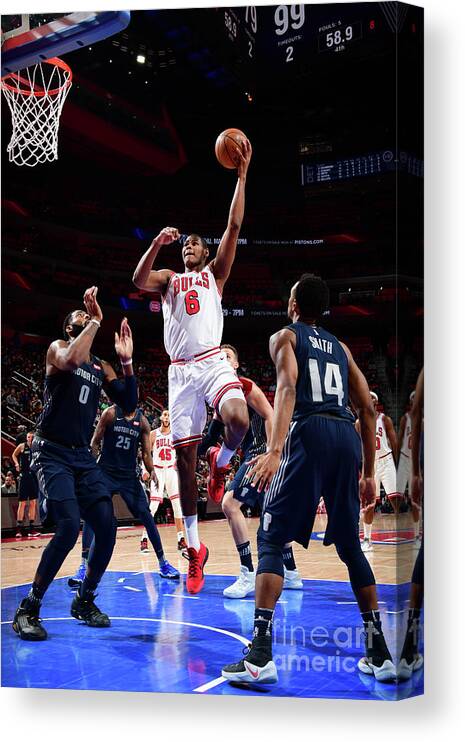 Cristiano Felicio Canvas Print featuring the photograph Chicago Bulls V Detroit Pistons by Chris Schwegler