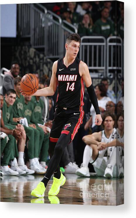 Tyler Herro Canvas Print featuring the photograph Miami Heat V Milwaukee Bucks by Gary Dineen